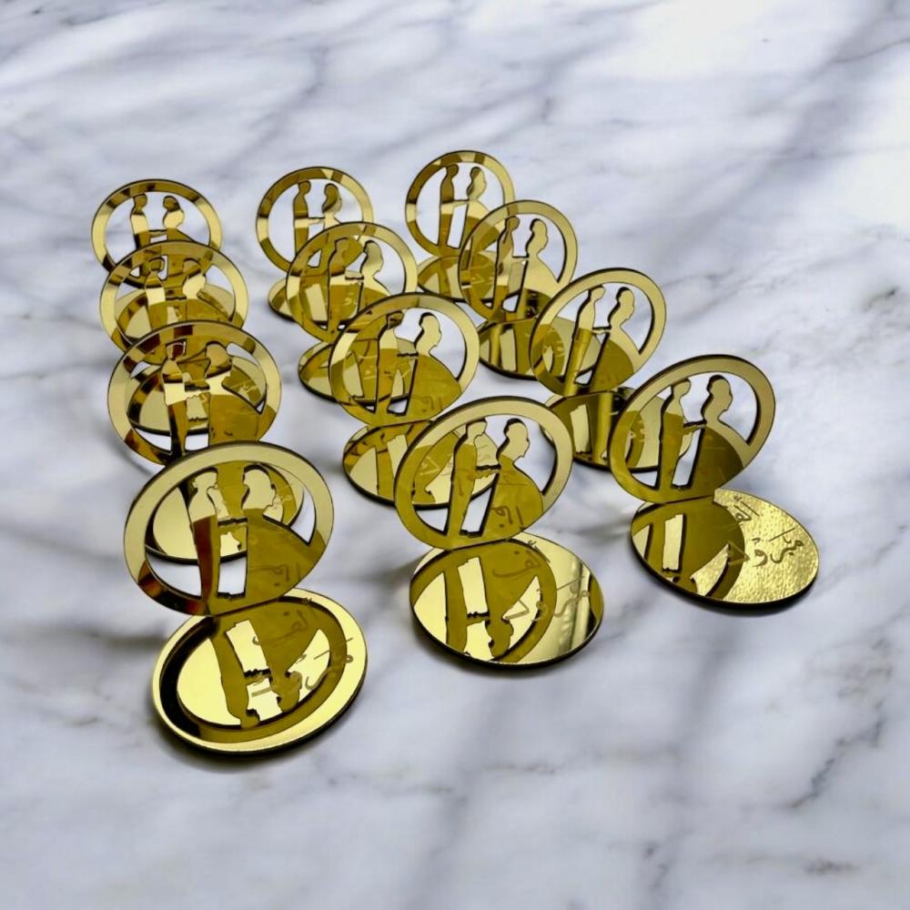 توزيعات زواج ذهبية بدون مسك أو عود شكل عروسين