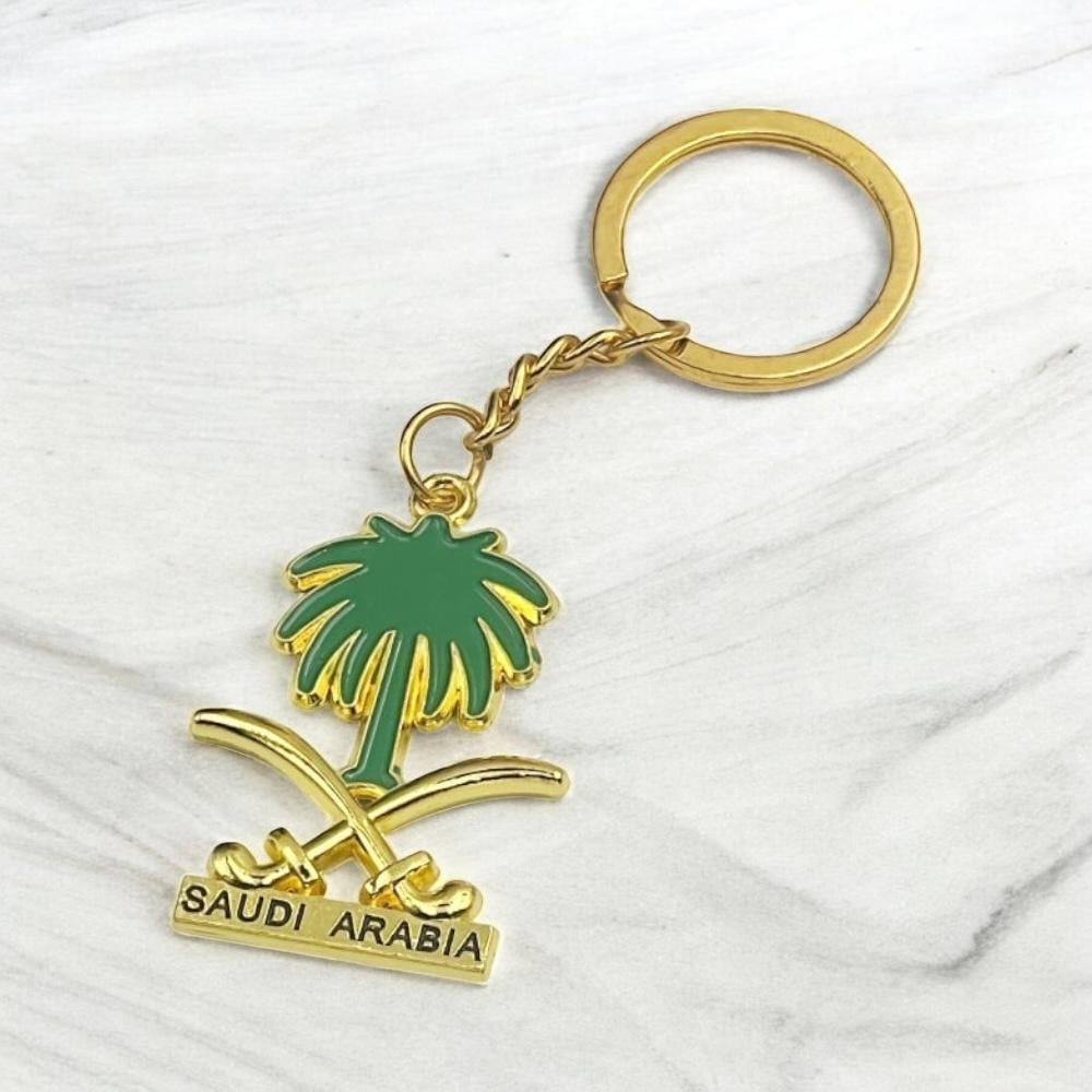 ميدالية مفاتيح أنيقة برمز المملكة السيفين والنخلة