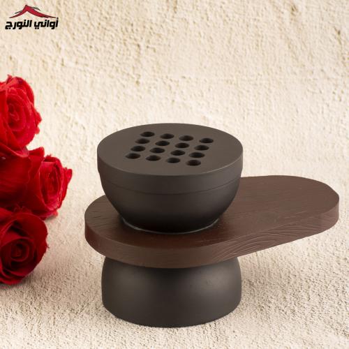 مبخر أسود بيد