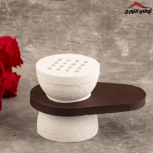 مبخر أبيض بيد