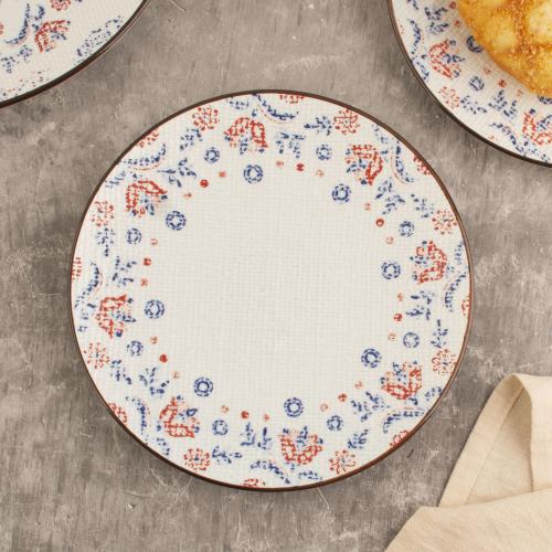 صحن أزرق  وأحمر مزخرف