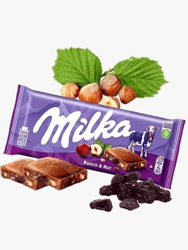 ميلكا شوكلاته مع حبيبات البندق والزبيب 100 جرام