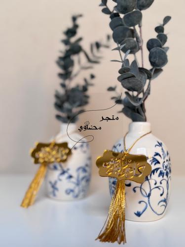 توزيعات فازة فاخرة صغيرة من السيراميك مزينة بنقوش...