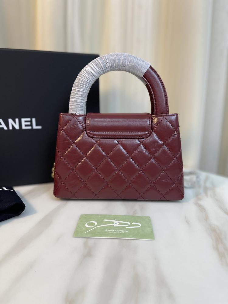 حقيبة يد وكتف من شانيل بقفل دوار CC - برغندي