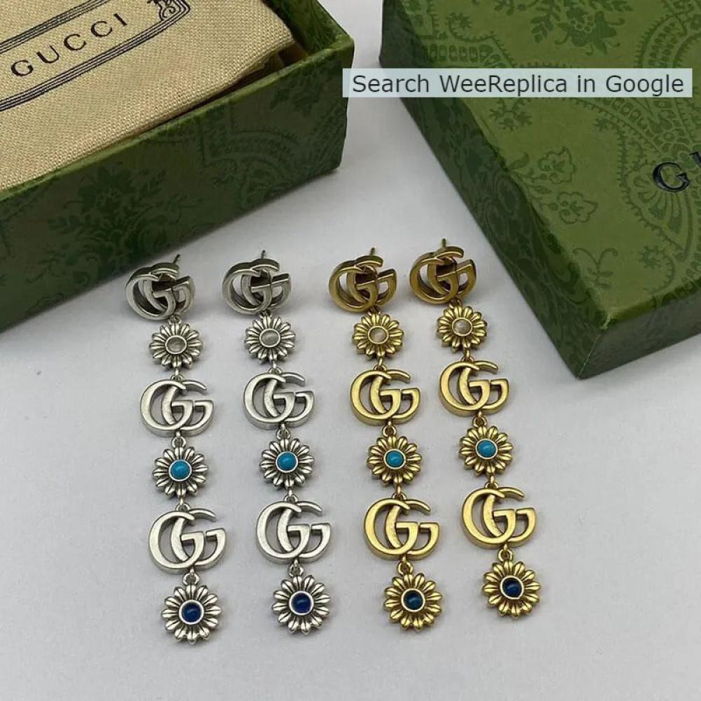 اقراط Gucci طويلة بتصميم زهور