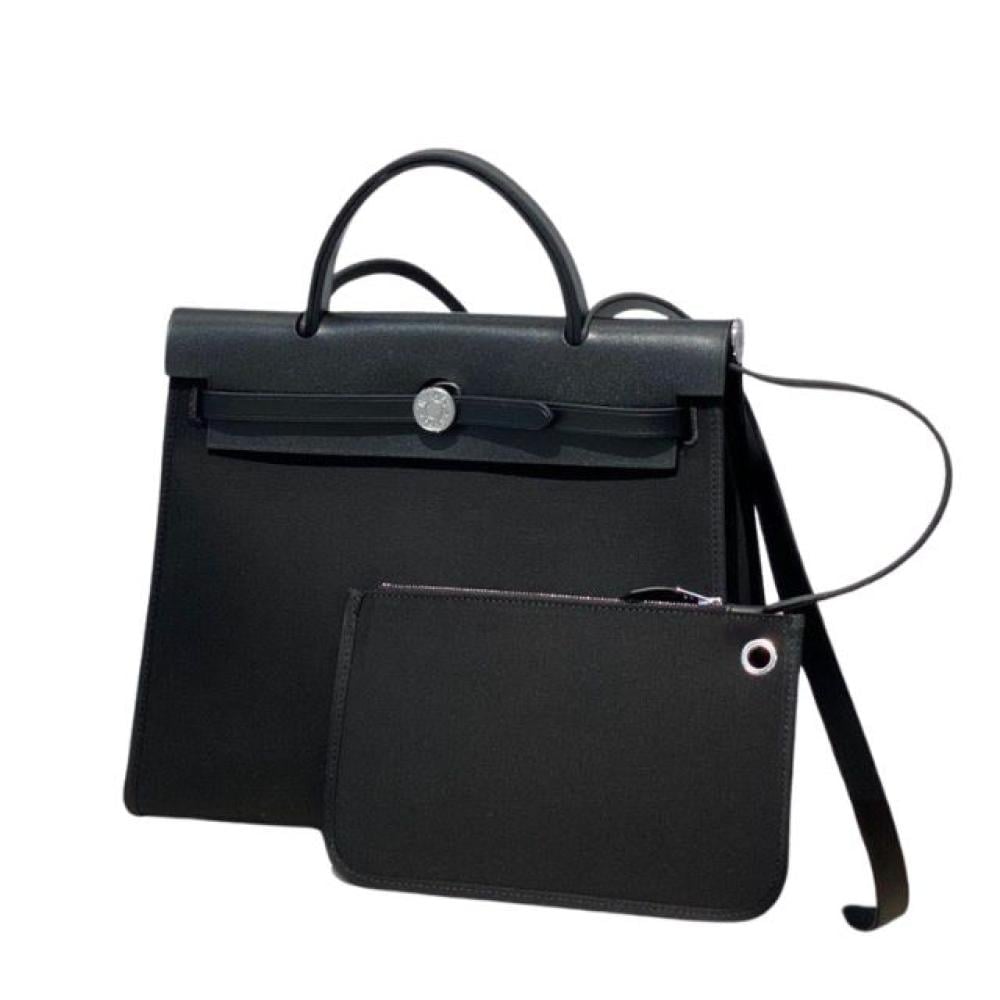 حقيبة هيرباج توال 31 بقماش وجلد أسود من ايرميز
