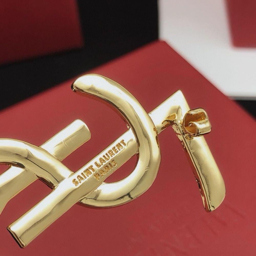 دبوس سان لوران YSL ذهبي بصفي كريستال مزدوج