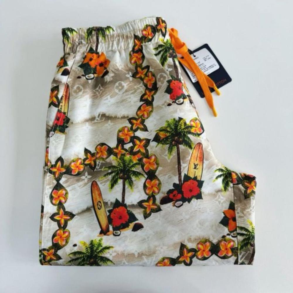 شورت سباحة مونوغرام مطبوعة بالأنماط الاستوائية من لويس فيتون