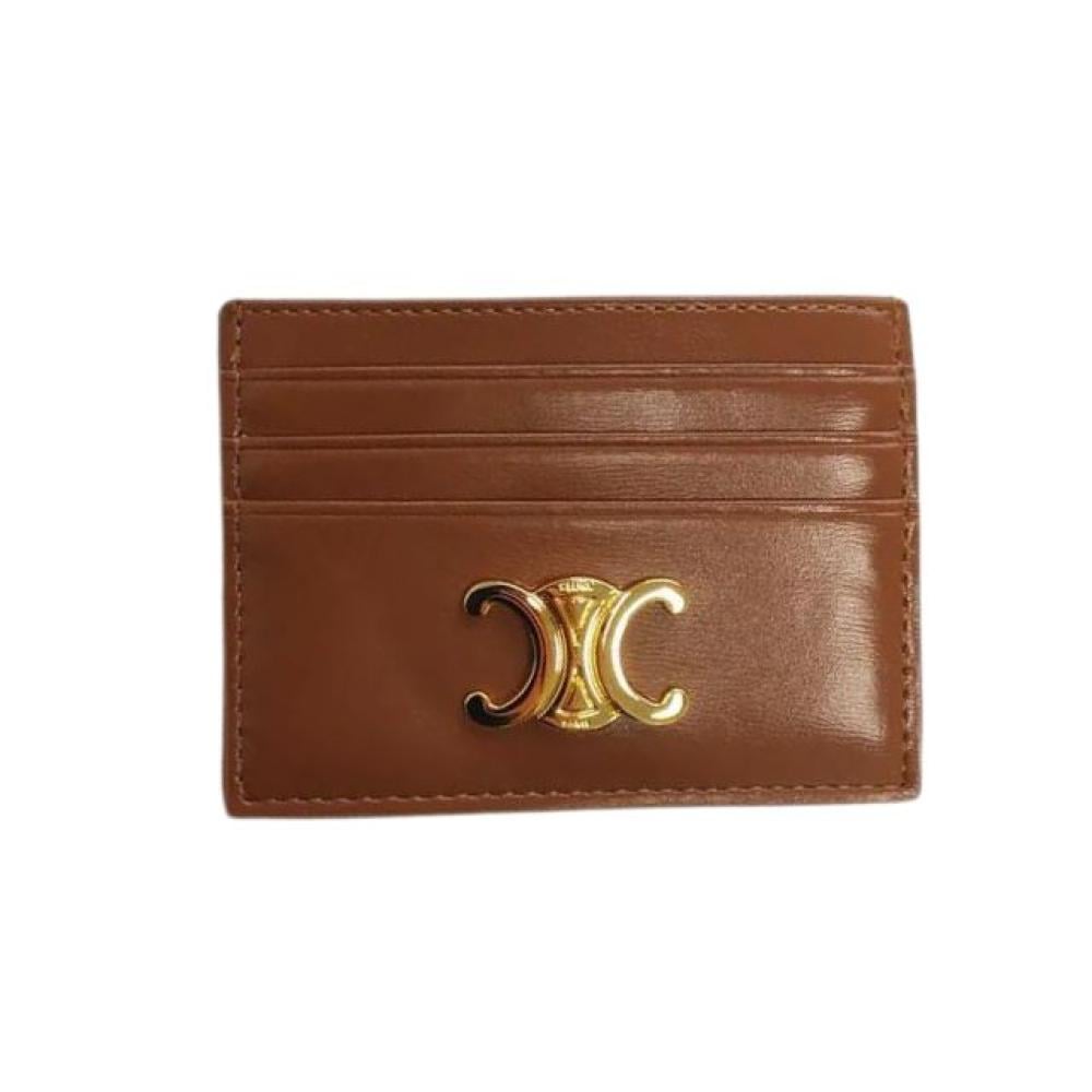 محفظة بطاقات تريومف من الجلد اللامع بشعار سيلين الذهبي