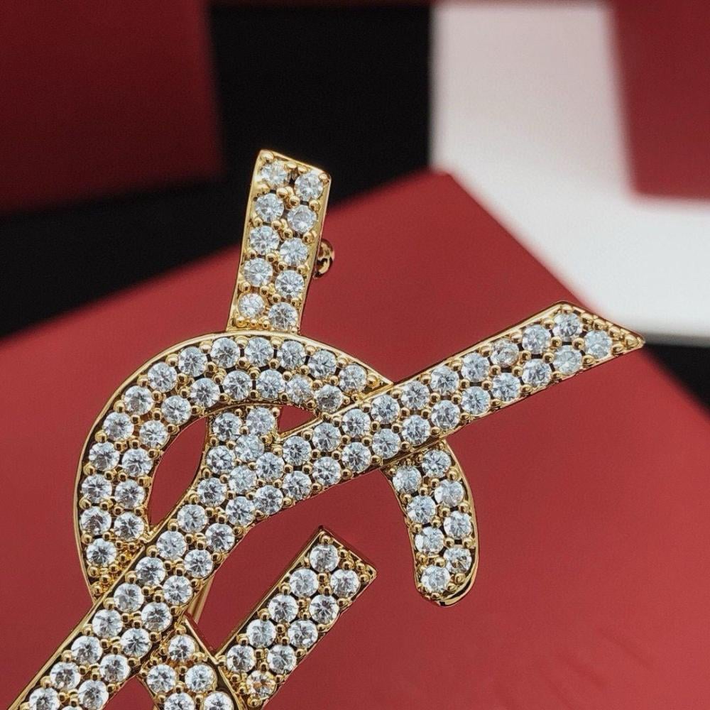 دبوس سان لوران YSL ذهبي بصفي كريستال مزدوج