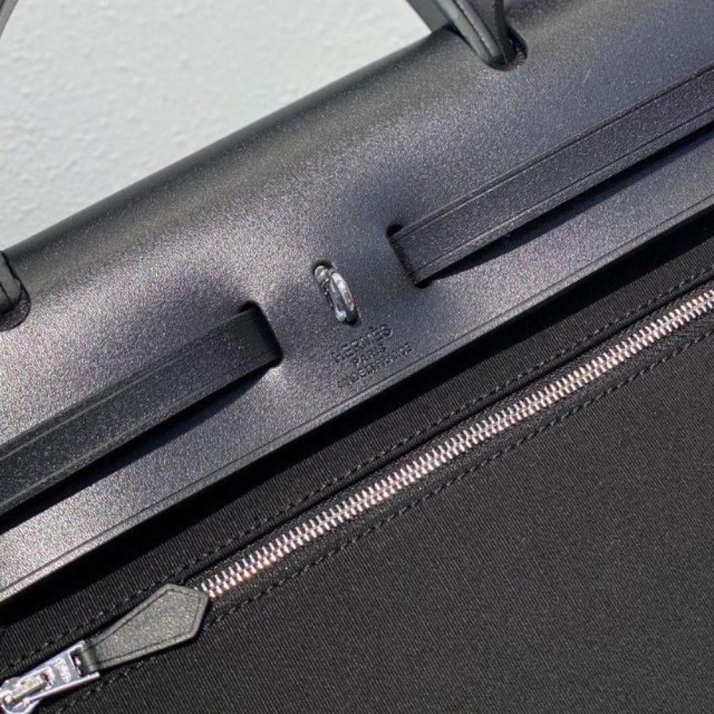 حقيبة هيرباج توال 31 بقماش وجلد أسود من ايرميز