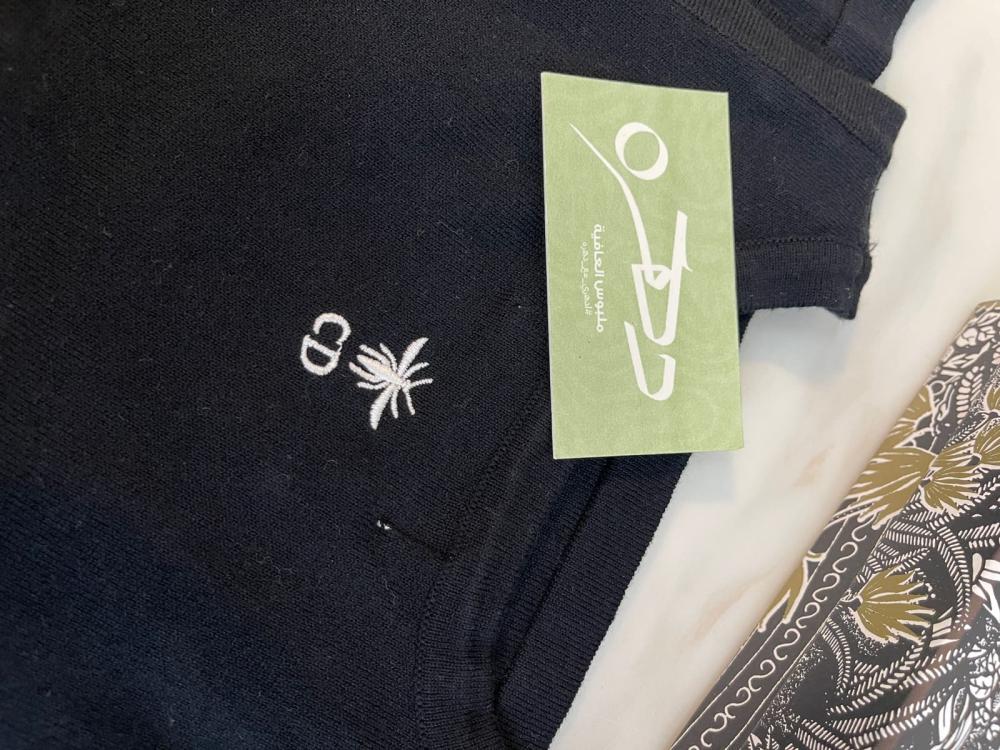 توب ديور المرصع باللؤلؤ