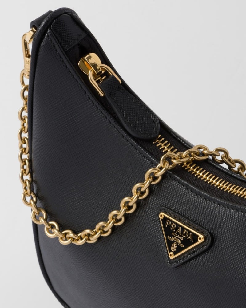 شنطة برادا رئدشن 2005 هاردوير ذهبي - أسود