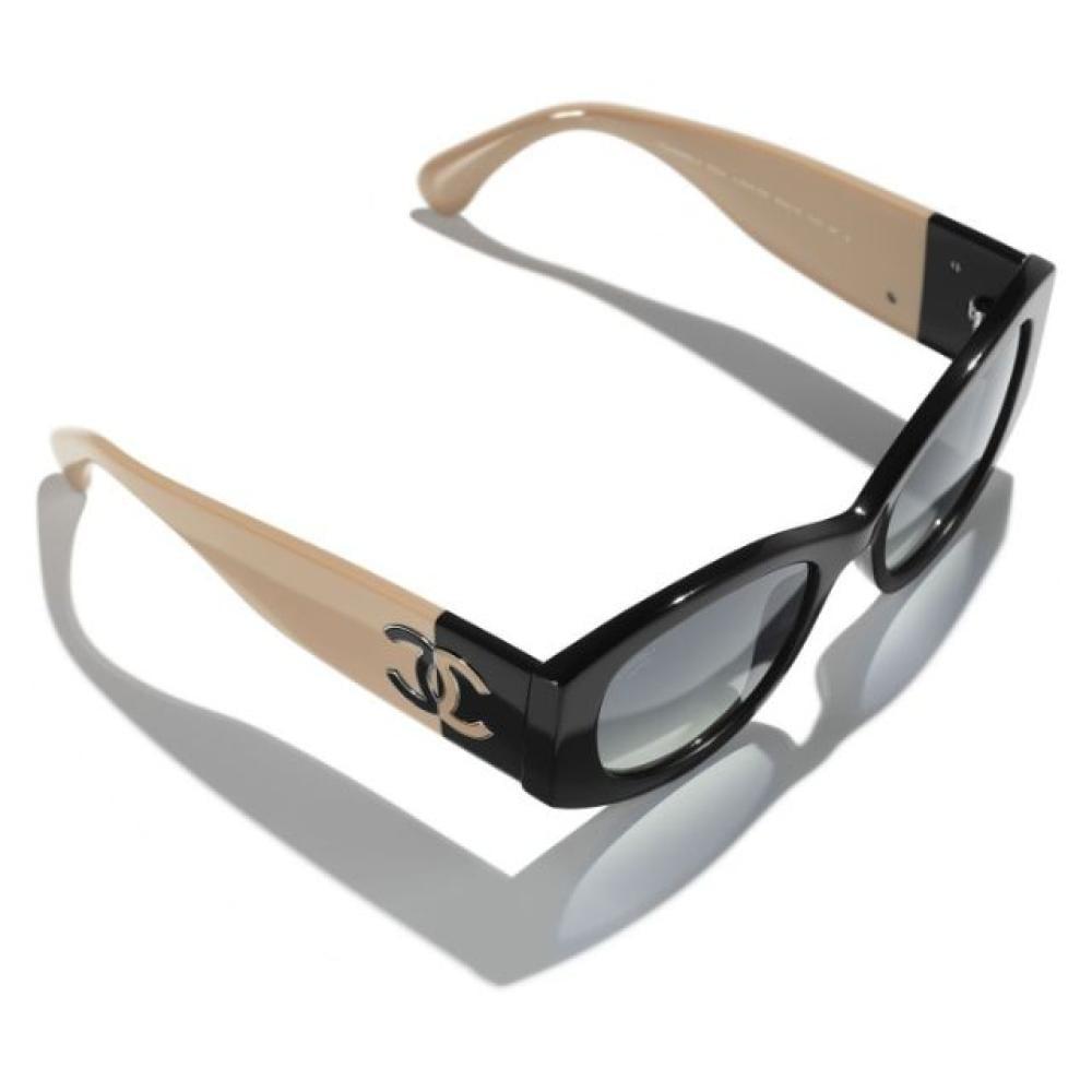 نظارة شمسية بيضاوية CH5524 C534/S8 من شانيل بلون أسود وبني