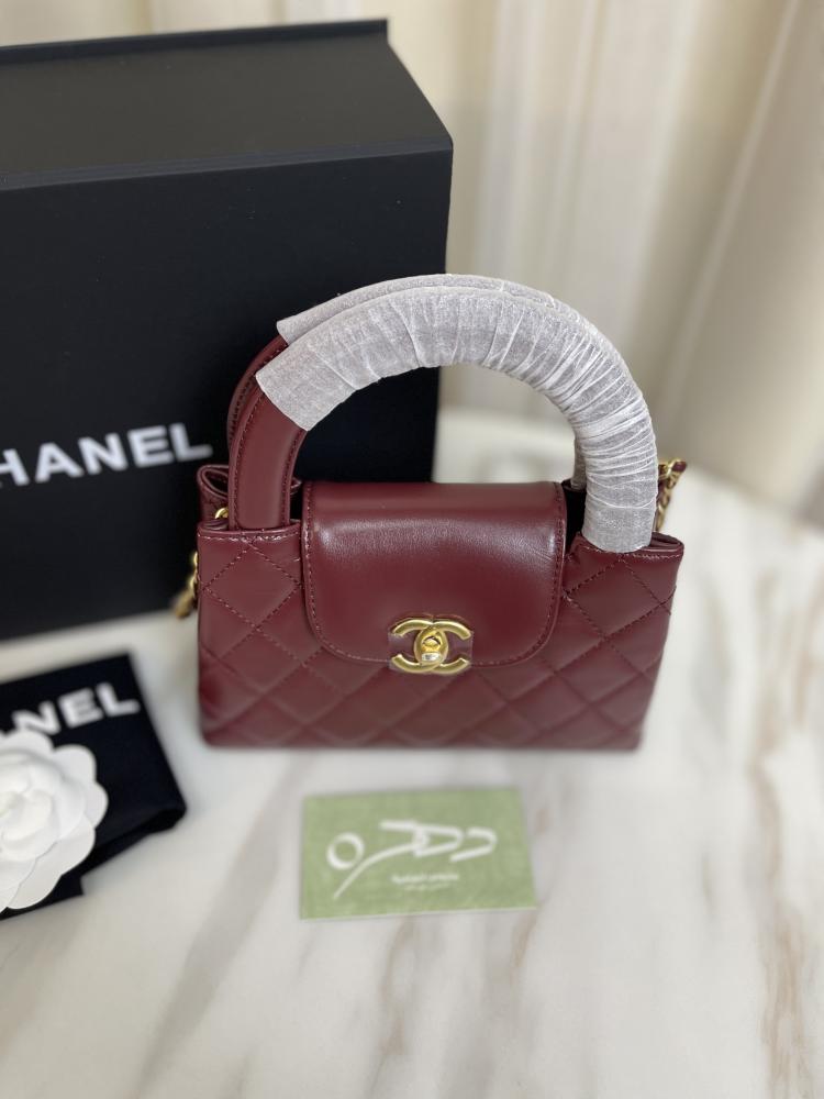 حقيبة يد وكتف من شانيل بقفل دوار CC - برغندي