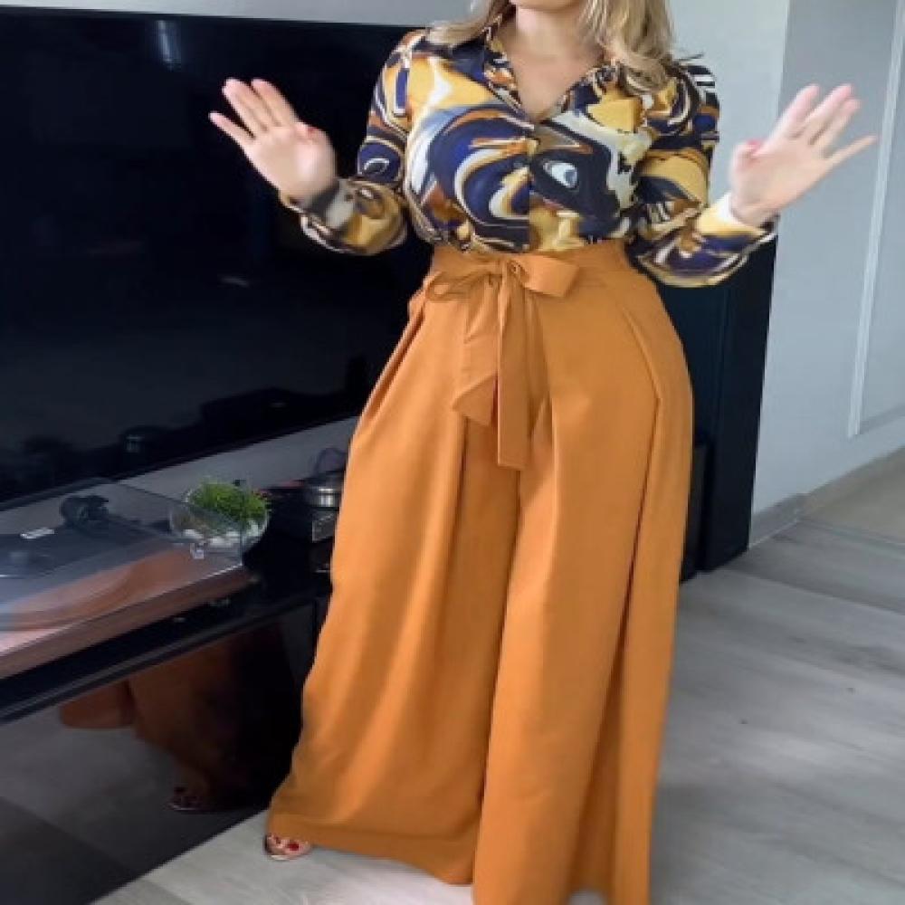 قميص نسائي طويل وبنطال قطعتين