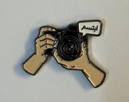 ستيكر معدني ابتسم