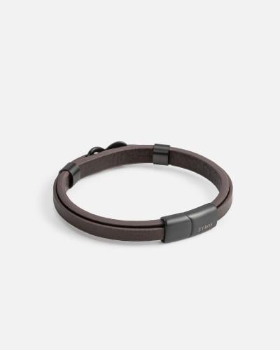 Two brown leather bracelets joined together