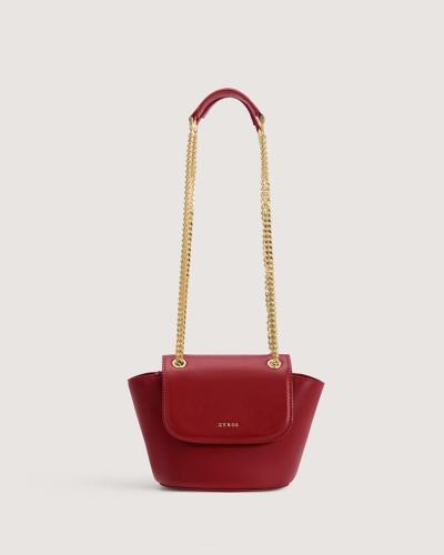 Small women's handbag in a burgundy color