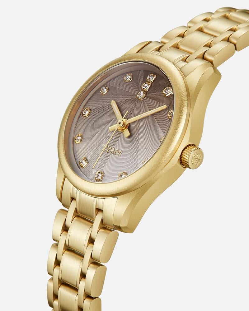 A women's watch with a perfect design and size in gold color.