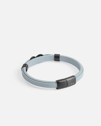 Two blue leather bracelets joined together