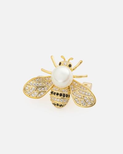 Women's brooch with an eye-catching design in gold