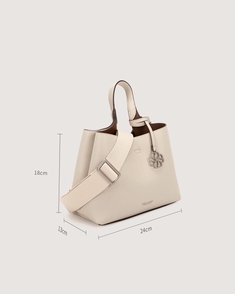 Women's handbag with a practical design in beige color