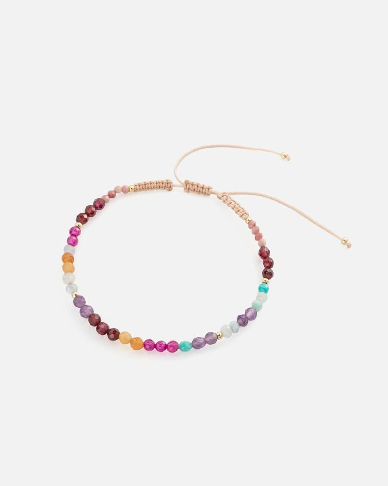Women's bracelet with colorful beads and woven threads