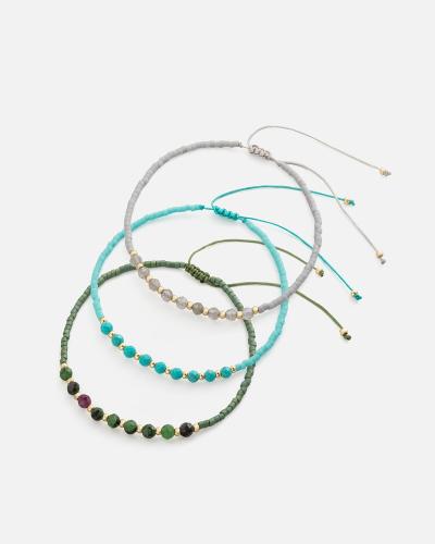 Bracelets made of threads and beads in turquoise, gray and green