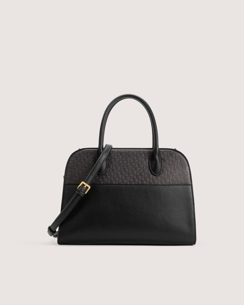 شنطة نسائية بحجم واسع بلون أسود