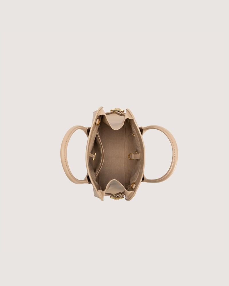 شنطة نسائية بحجم واسع بلون وردي