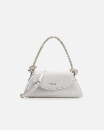A medium-sized women's handbag in silver, perfect for any occasion.