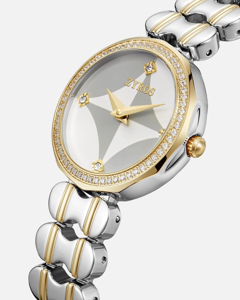 A distinctive women's watch with a gold and silver design.
