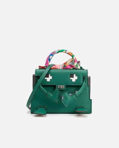 A distinctive women's handbag made of green leather