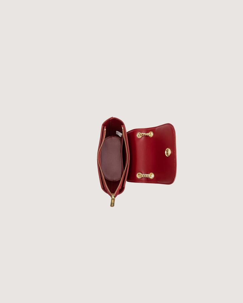 Small women's handbag in a burgundy color