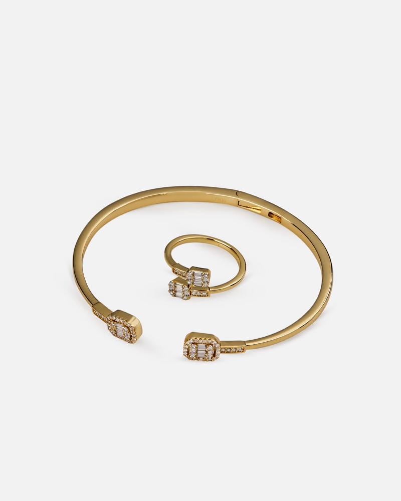 A distinctive gold-colored bracelet and ring set
