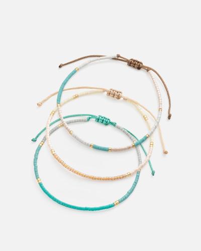 Bracelets made of threads and beads in gold, silver, and gray