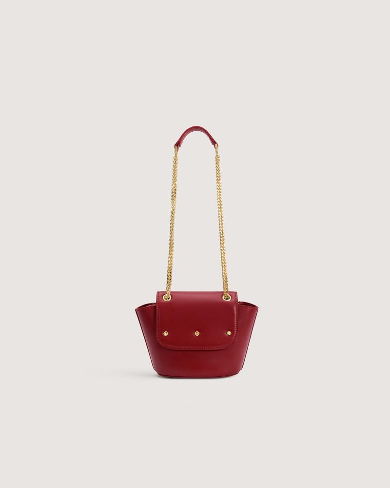 Small women's handbag in a burgundy color