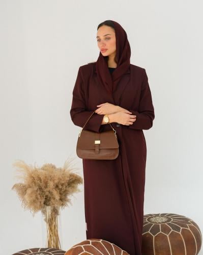 شنطة نسائي بحجم متوسط من الجلد البني