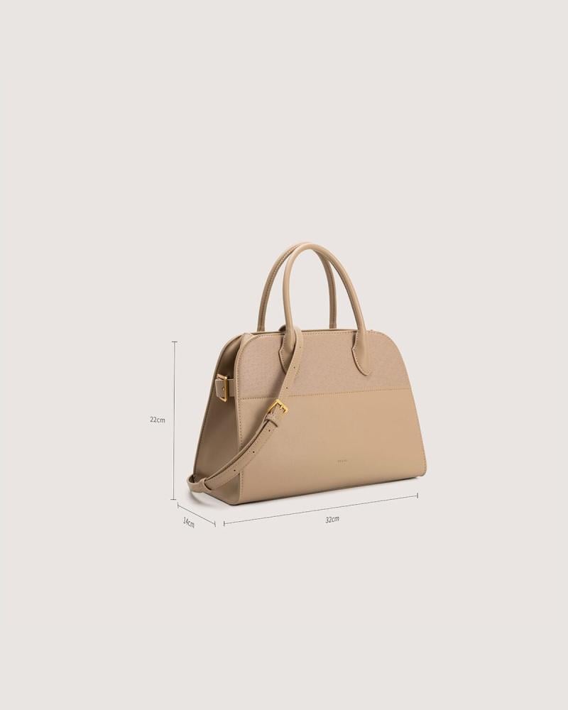 شنطة نسائية بحجم واسع بلون وردي