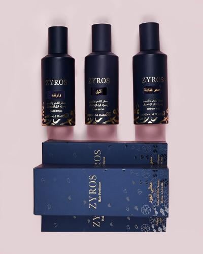 A set of three hair and body perfumes