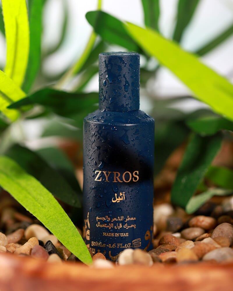 A set of three hair and body perfumes