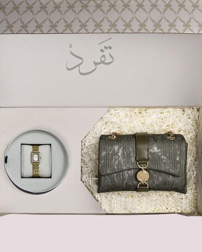 A women's gift: a watch and a bag with an eye-catching design.