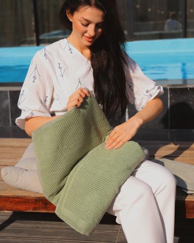 Two classic green towel sets