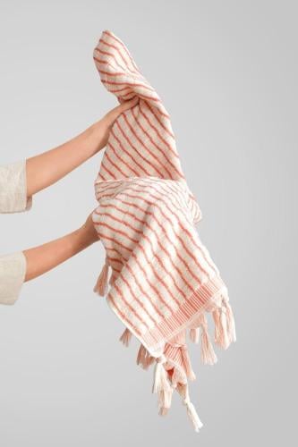 Beige and orange body towel