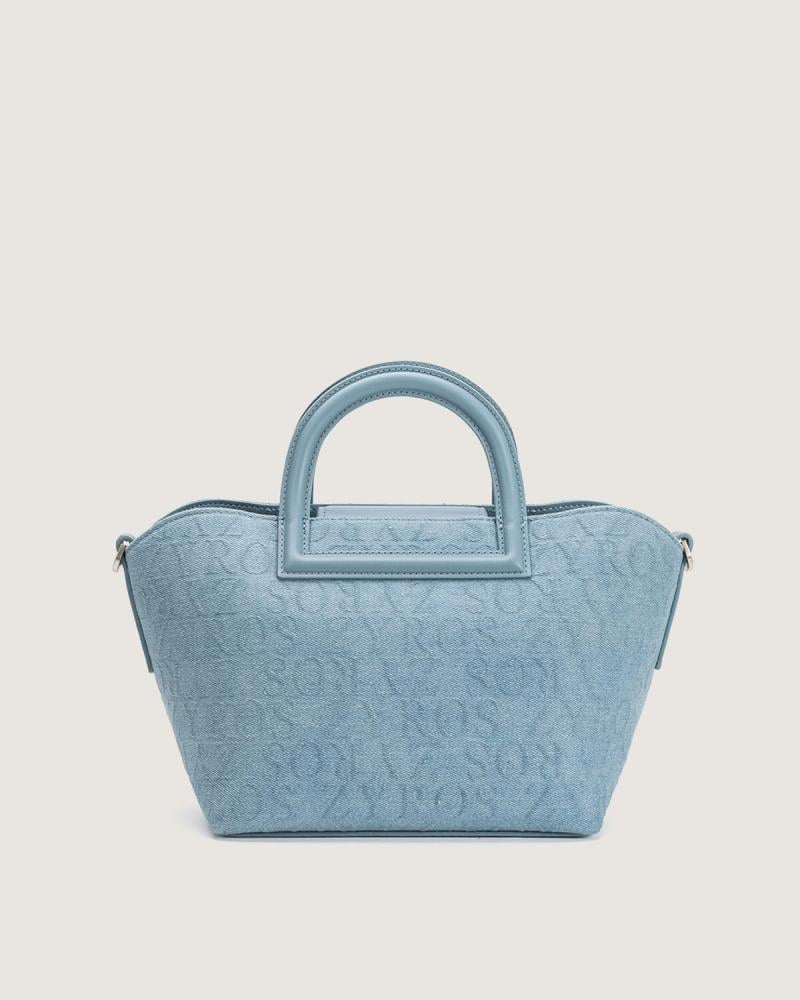 شنطة نسائية من القماش الجينز بلون أزرق فاتح