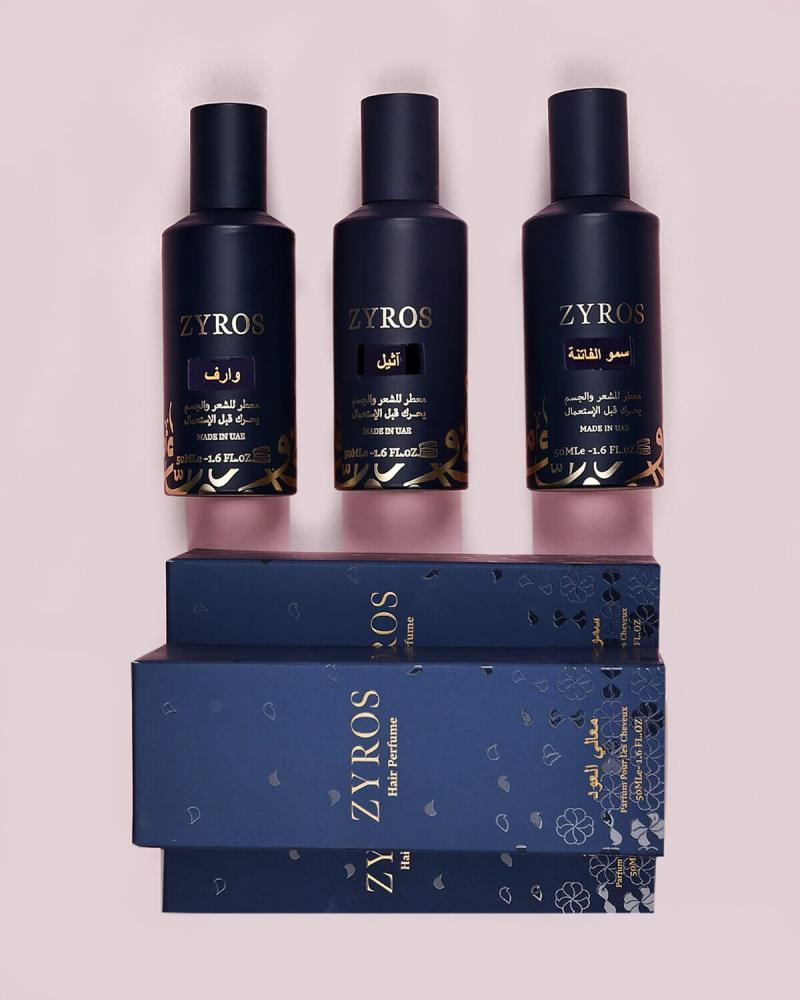A set of three hair and body perfumes