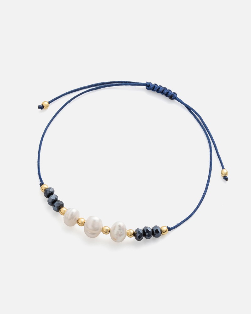 Soft bracelet with navy blue thread