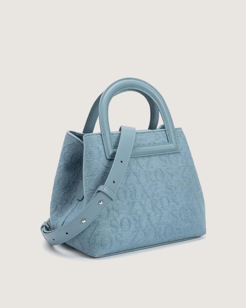 شنطة نسائية من القماش الجينز بلون أزرق فاتح