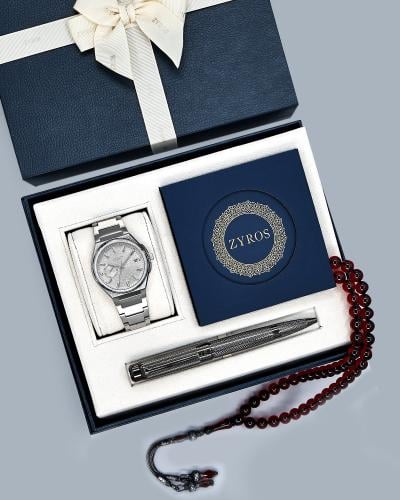A royal men's gift set including prayer beads, a pen, and a watch.